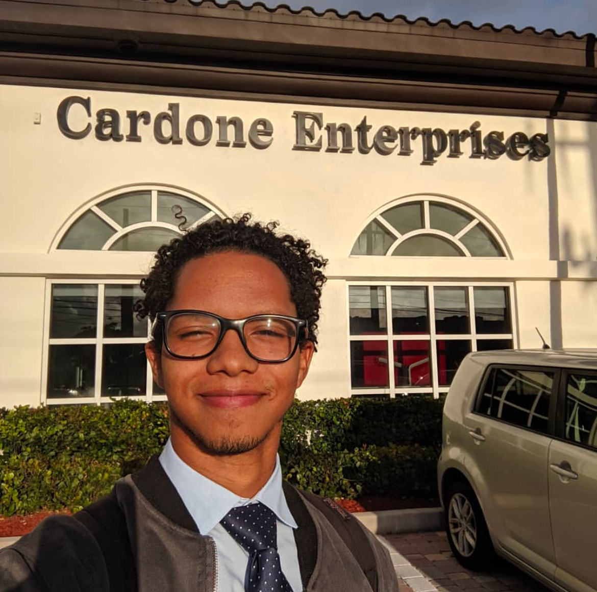 Julio Mata outside Cardone Enterprises, where he started as an analyst